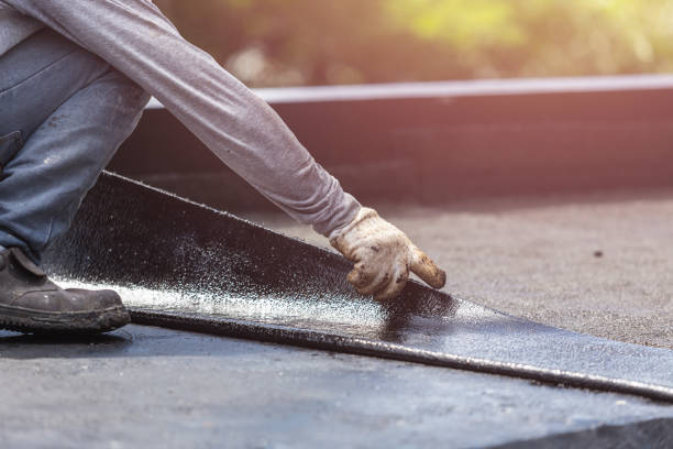 Professional Waterproofing technician working in Norwood, NY